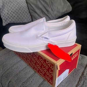 White slip on vans
